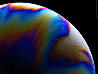 Illustration for article titled Photos of Soap Bubbles that Look Like Trippy Exoplanets